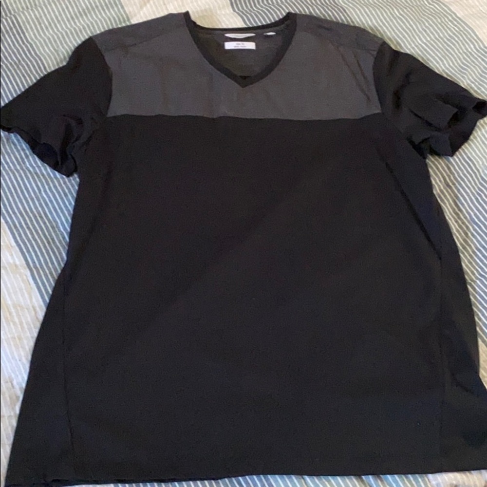 Calvin Klein V-neck black shirt.